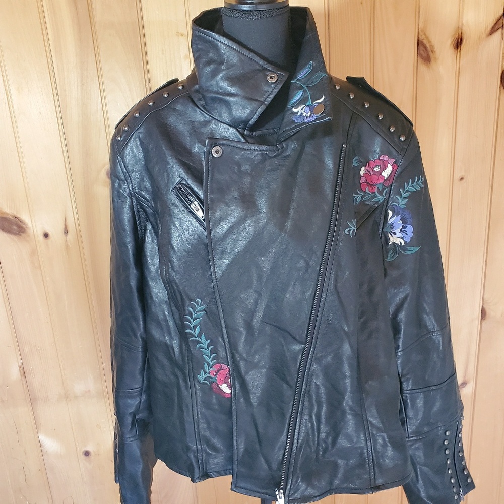 Woman's city chic moto jacket with flower detail